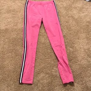 Pink,navy blue, and white leggings.